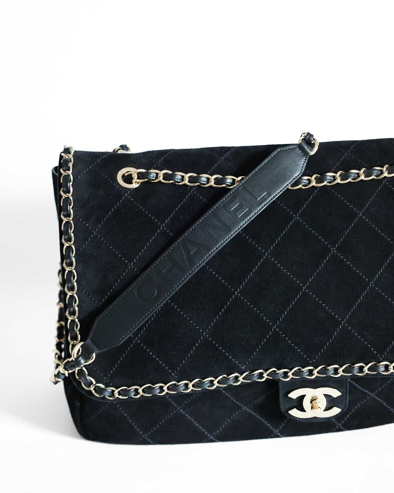 Chanel x Pharrell Black Suede bag detailed view of the strap