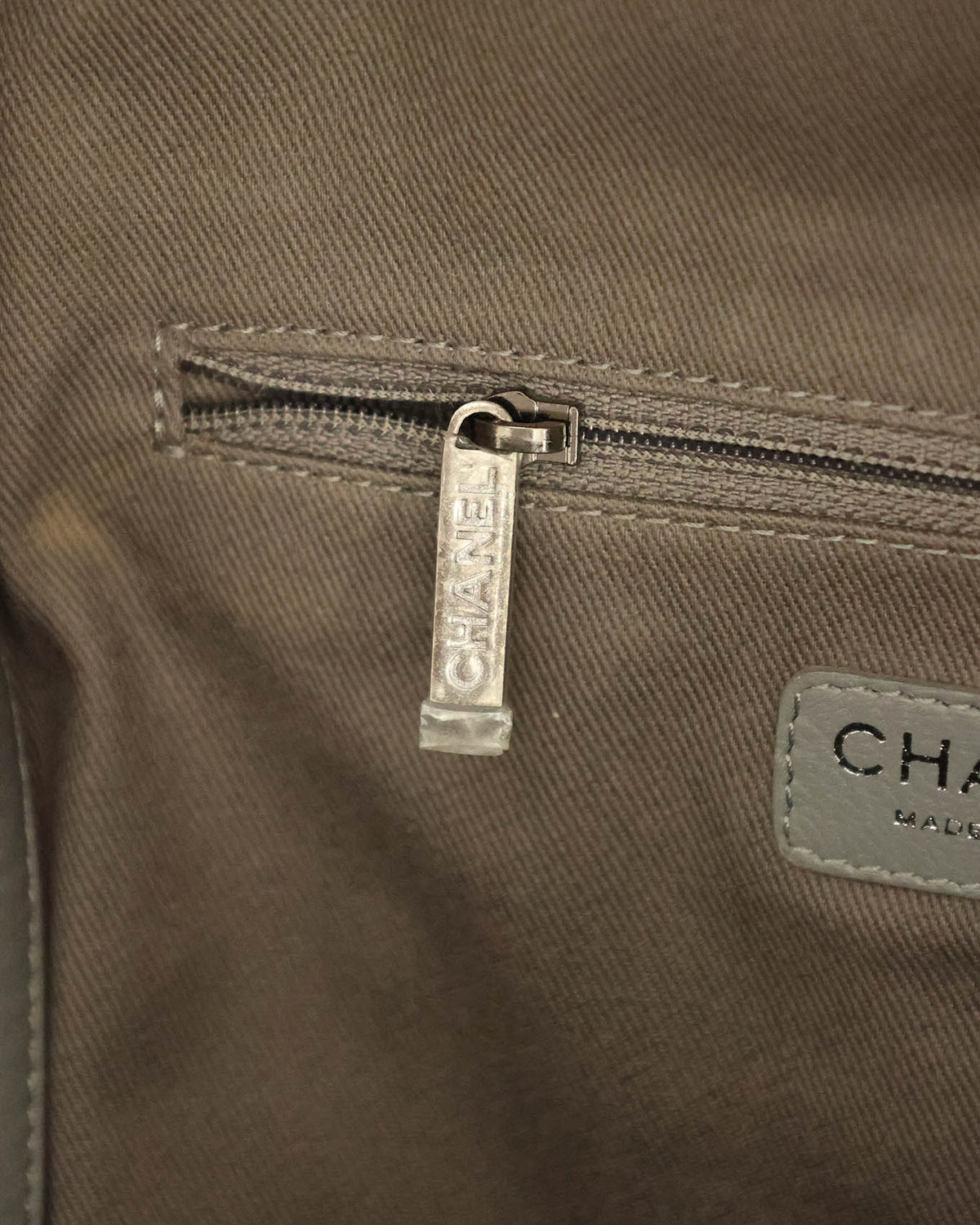 Chanel SS14 graffiti backpack ruthenium zipper hardware detail