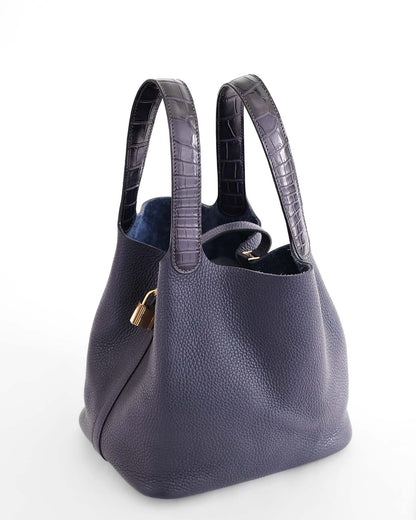 Hermès Picotin 22 Bleu Nuit Clémence Alligator Touch 2019 | ELUXE STORE Elegance du luxe

Year and Stamp: 2019 / D
Color: Bleu Nuit
Hardware: GHW (Polished Gold)
Leather or Material: Clémence and Alligator Mississippiensis (Square Stamp)
Dimensions: 22 x 21 x 17cm
Packaging: Dustbag and Lock and Keys

We buy and sell pre-loved Hermes bags, Hermes Birkin, Hermes Kelly, Hermes Picotin, Evelyne, Chanel Flap Bags, Chanel Graffiti Bags and more. In Wien Vienna Österreich Austria, preloved Designer Bags