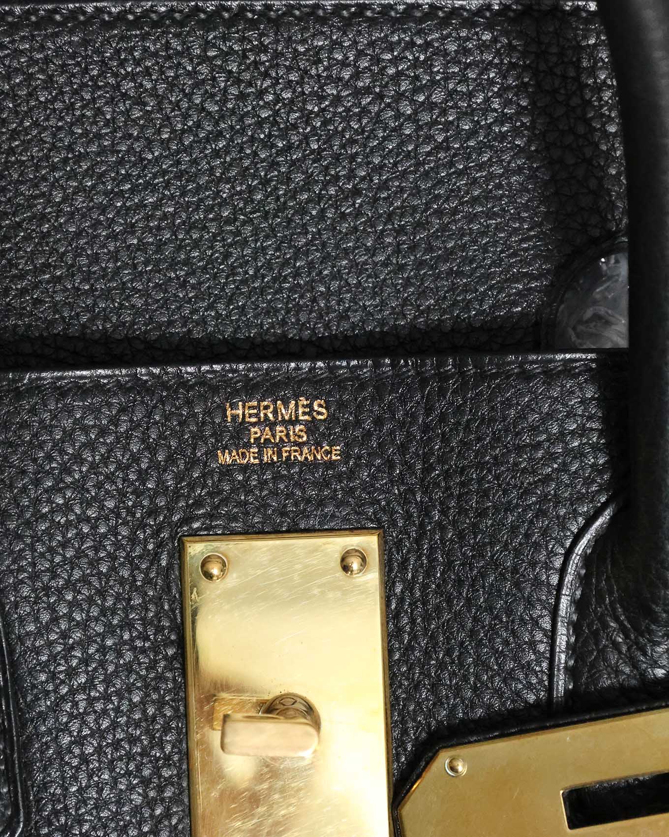 Close-up of Hermès Togo leather grain in black with gold hardware